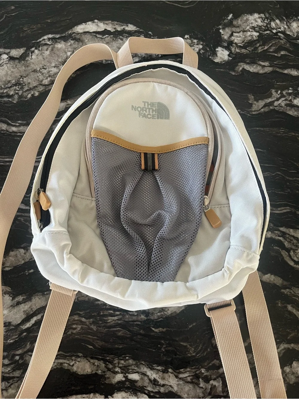 The North Face Cream and Gray Mini Backpack with Tan Accents